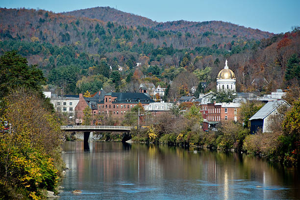 Vermont State Capitol on the Winooski River in autumn stock photo