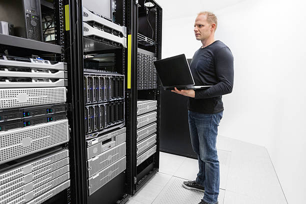 istock It consultant monitor servers in data center 485022435