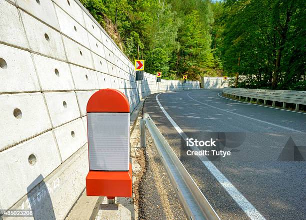 Kilometer Stone Post On The Roadside In Romania Stock Photo - Download Image Now - Mile, Stone Material, 2015