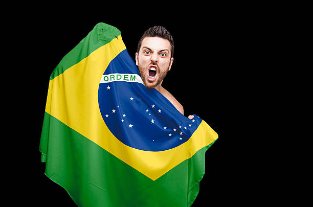 istock Brazilian soccer player celebrates on black background 485023320