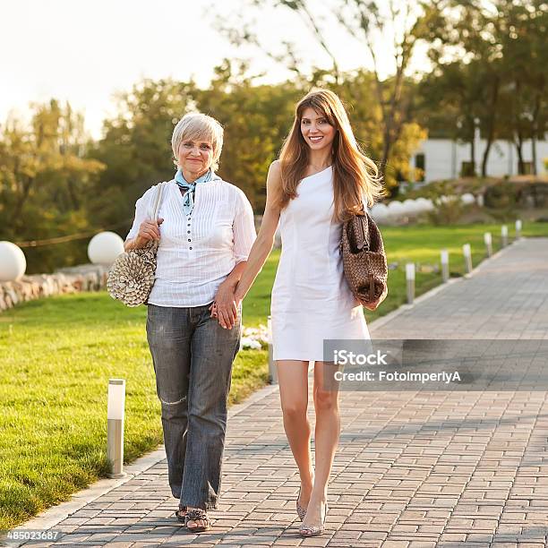 Adult Mother And Daughter Stock Photo - Download Image Now - Active Seniors, Adult, Child