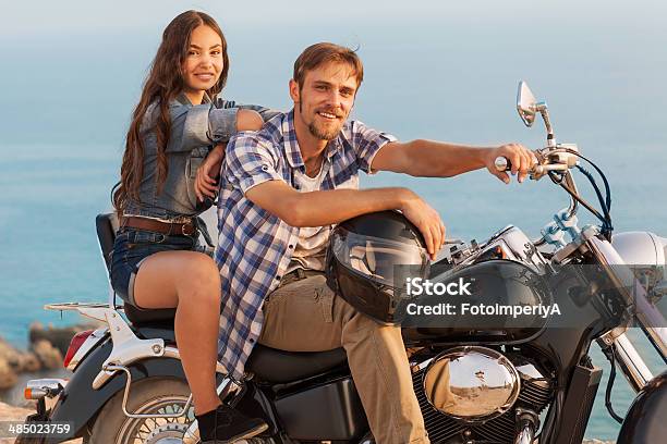 Biker Man And Girl Stock Photo - Download Image Now - Beauty, Motorcycle, Teenage Girls