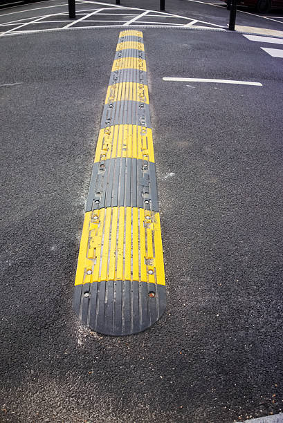 istock Speed reducing strip in car park 485025754