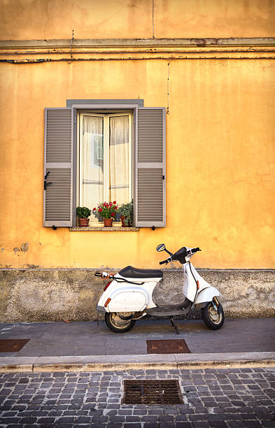 istock Old scooter and Italian wall, Rome Italy 485027674