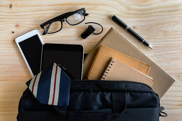 istock Businessman accessories and notebook bag on desk 485036172