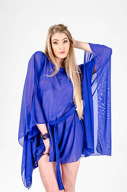 istock Beautiful long-haired blonde in a clear blue tunic 485036826
