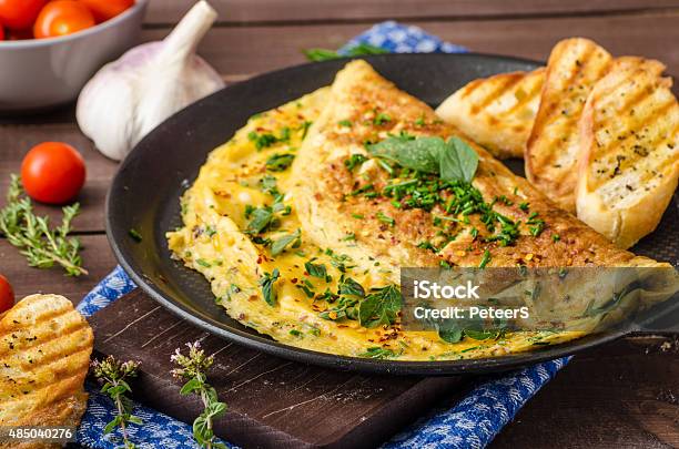 Herb Omelette With Chives And Oregano Stock Photo - Download Image Now - Omelet, Cheese, Breakfast