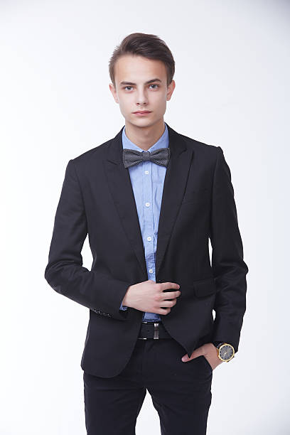 istock young handsome man in elegant suit with butterfly 485040856