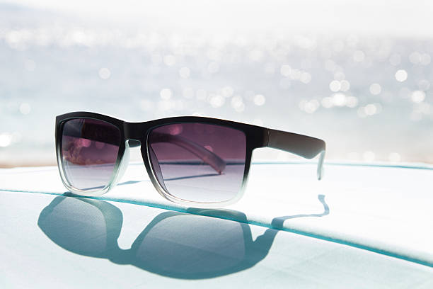 istock Sunglasses at the beach summer background 485041944