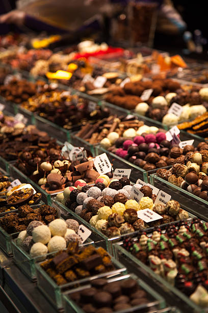istock Various Nuts, almonds, sweets and dried fruits at the market 485042878
