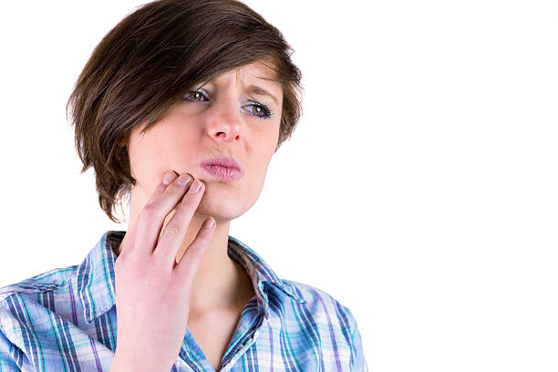 istock Pretty brunette with a toothache 485047424