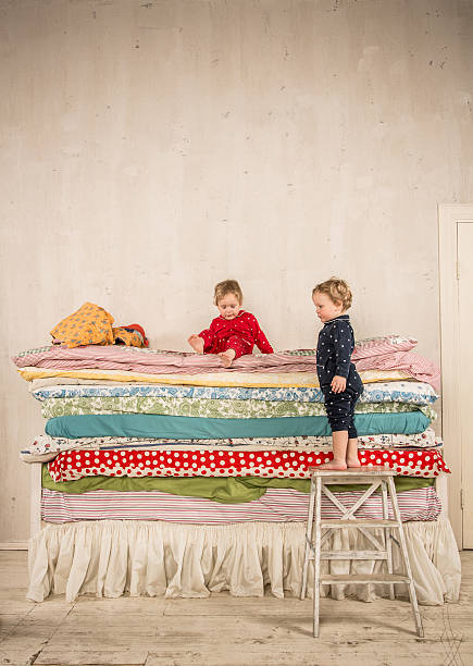 istock Children on the bed - Princess and the Pea. 485051196