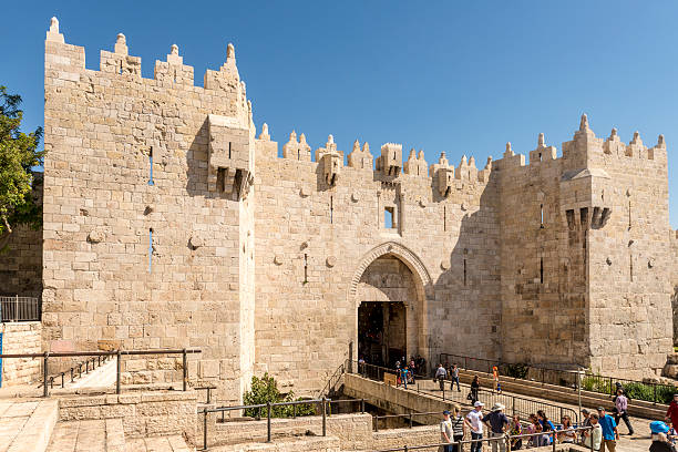 istock ancient city walls and towers in  old Jerusalem 485051416