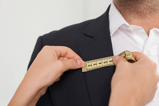 istock Skilled young female tailor is working with her customer 485052226