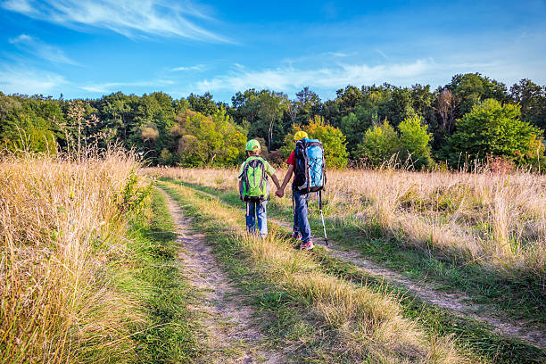 istock Two traveling kids with backpacks 485054362