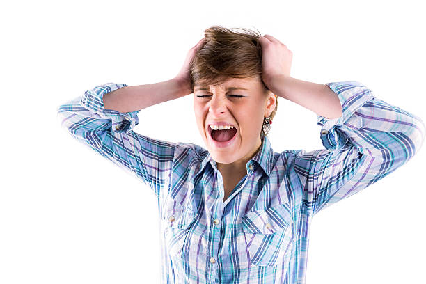 istock Pretty brunette shouting with hands on head 485054386