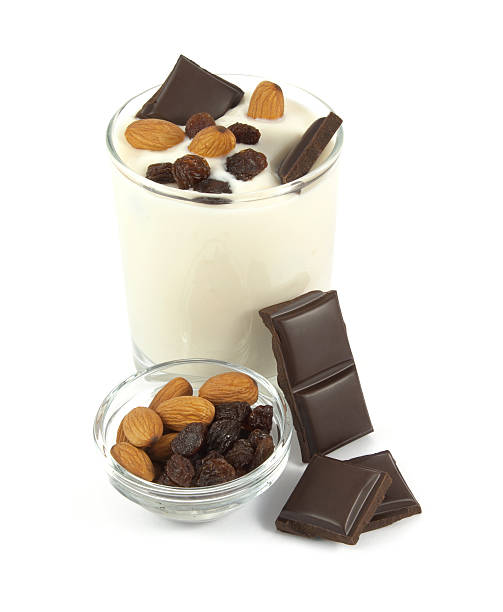 istock Sweet yogurt desert with chocolate, almonds and raisins 485054390