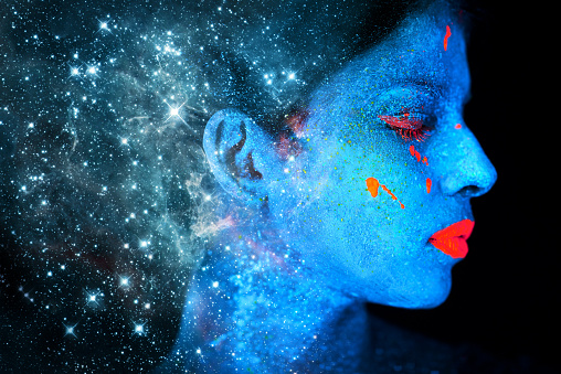 Shot of a young woman posing with neon paint on her facehttp://195.154.178.81/DATA/i_collage/pi/shoots/784268.jpg
