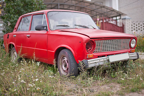 istock Side view of red old rusty car 485059544