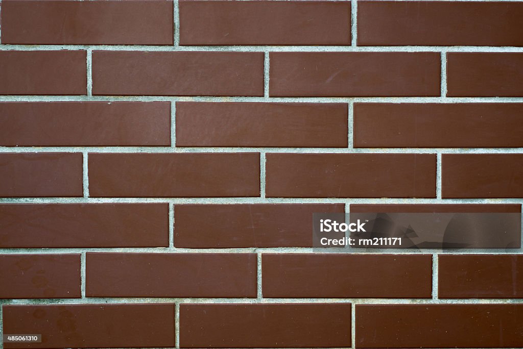 wall of brown brick dirty monotonous wall of brown bricks 2015 Stock Photo