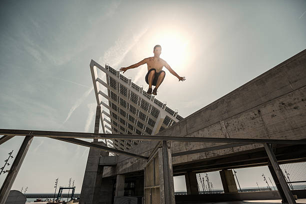 istock Parkour traceur jumping in the city 485061706