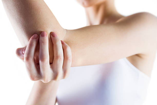 istock Fit woman with elbow injury 485064842