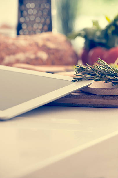 istock Digital tablet in a kitchen with food. 485064976