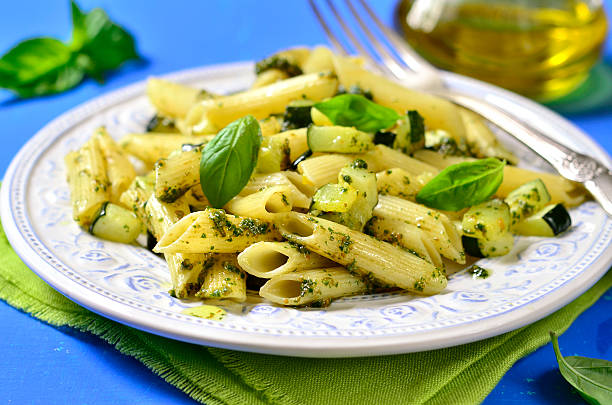 istock Penne with zucchini and basil pesto. 485068224