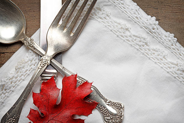 istock Thanksgiving Place Setting On Linen Napkin with Red Fall Leaf 485072114