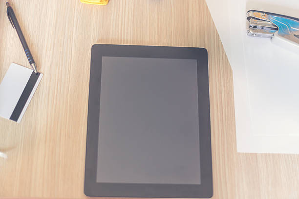 istock Wood desk and office supplies 485072354