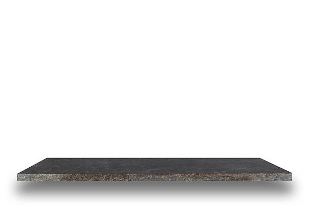 istock Empty top of natural stone shelves isolated on white background 485073246
