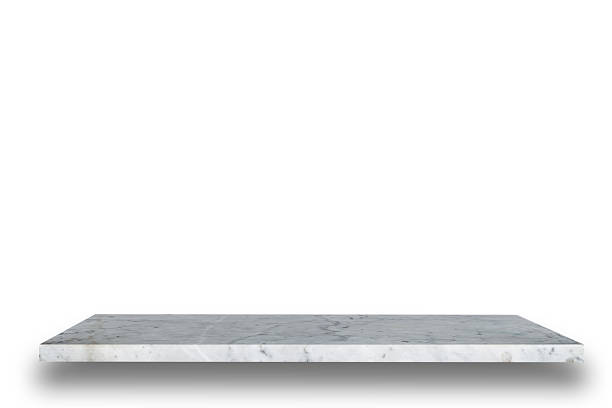 istock Empty top of natural stone shelves isolated on white background 485073302