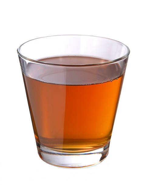 istock glass of apple juice 485075819