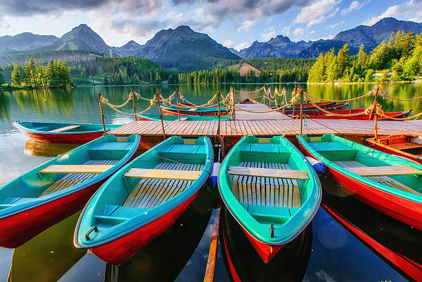 istock Boat on the dock surrounded mountains. Fantastic Shtrbske Pleso 485076816