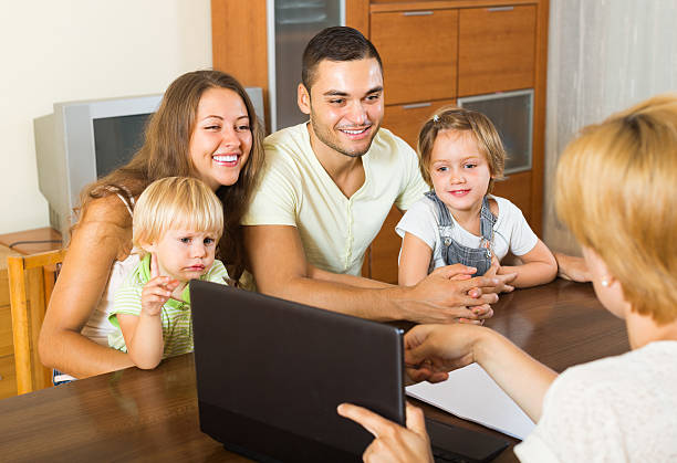 Family with insurance agent