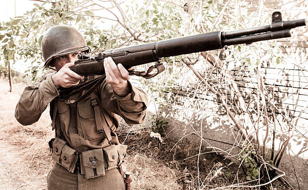 istock Soldier Aiming a Rifle WWII 485078154