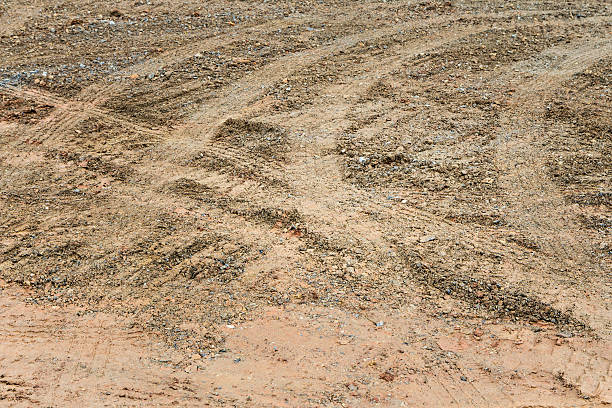 istock Wheel tracks on red lateritic soil 485081024