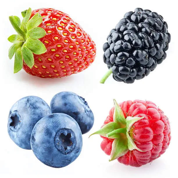 Photo of Berries - raspberry, strawberry, blueberry, mulberry. Collection isolated on white