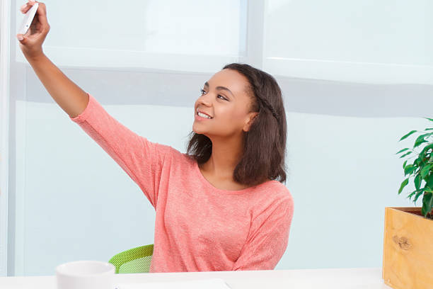 istock Pretty woman doing selfie 485082158