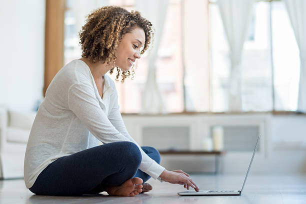 istock Woman on the internet using a laptop at home 485082254