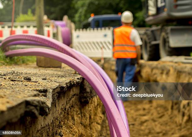 Fiberglass Network Under Construction Stock Photo - Download Image Now - Fiber Optic, Cable, Installing