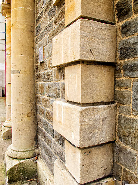 istock Stone wall with balustrades and cement cornerstones 485087064