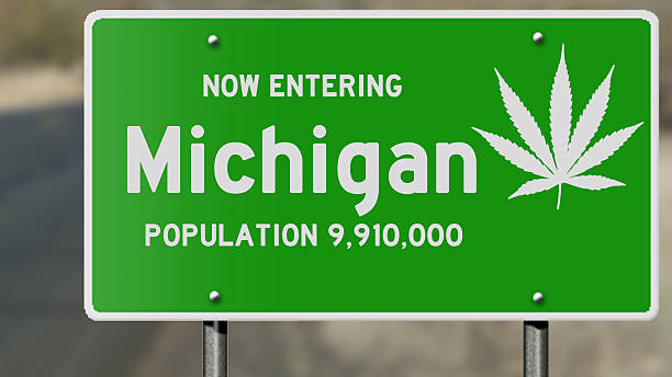 istock Michigan highway sign with marijuana leaf 485094822