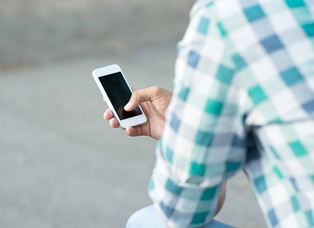 istock Photo of male hands using a smartphone 485097496