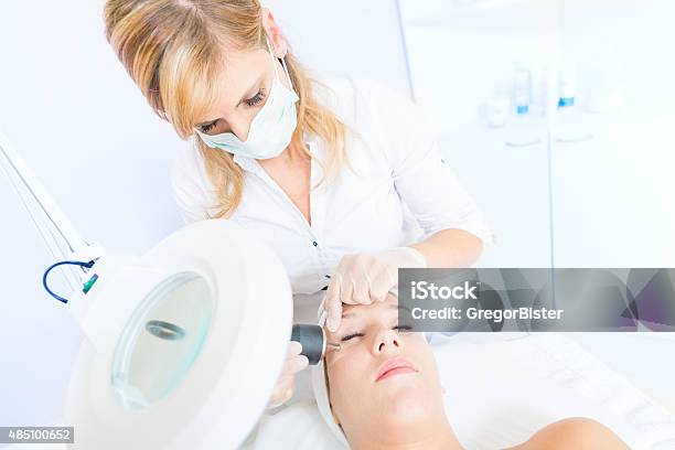 Face Treatment Stock Photo - Download Image Now - Human Skin, Laser, 2015