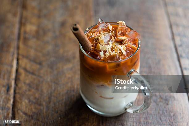 Thai Iced Tea With Almond Crush Stock Photo - Download Image Now - Chai, Ice Cube, Cold Temperature