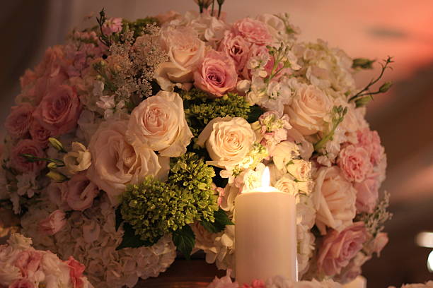 istock Beautiful Pink Flowers with Candle 485105940
