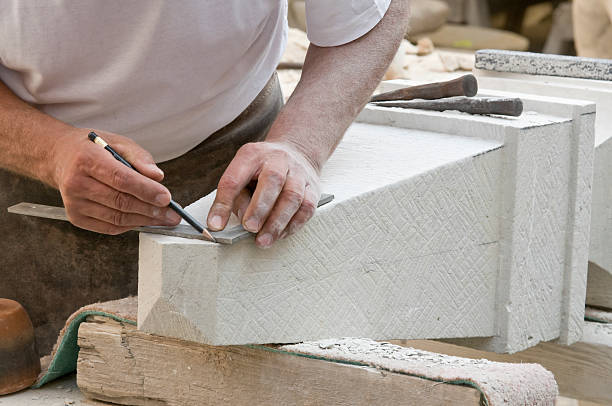 istock Stonemason at work, mark with angle and pencil 485107186