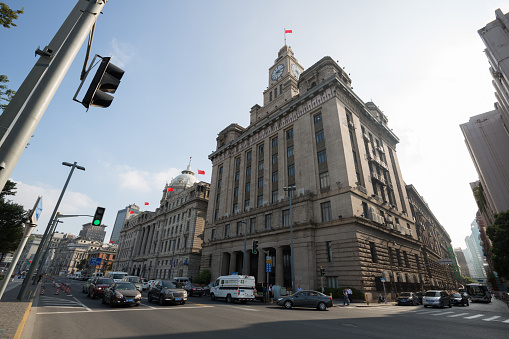 Front view from a terrace of the buildings with art novoux architecture located in Microcentro, Avenida de Mayo, Buenos Aires. With Parisian style and renowned domes.Illuminated by natural light, with a blue sky in the background.