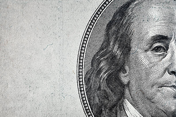 Dollars closeup. Dollars closeup. Benjamin Franklin's portrait on one hundred dollar bill. us currency stock pictures, royalty-free photos & images